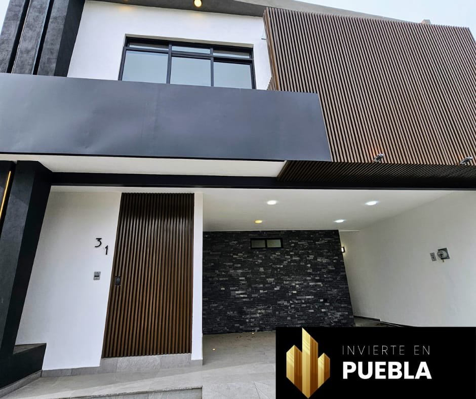 CASA EN VENTA CON ACABADOS PREMIUM EN LOMAS DE ANGELOPOLIS $ 4,660,000.00